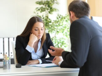 Salesman trying to convince to a bored client