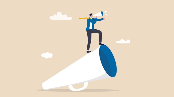 Leader communication, executive management skill to communicate with employee, send important message or announcement concept, businessman leader standing on big megaphone giving speech to public.