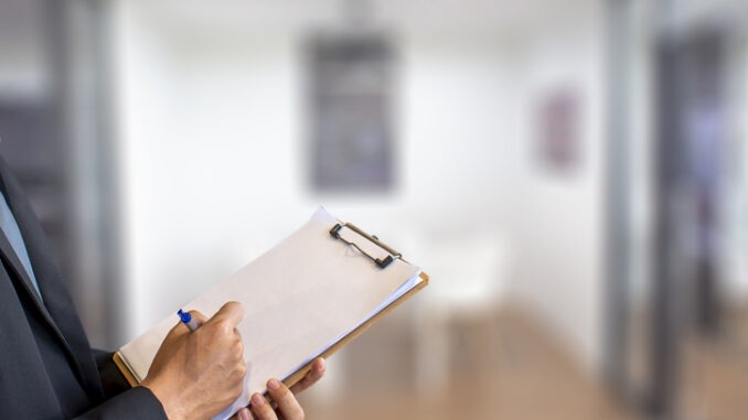 Person holding clipboard