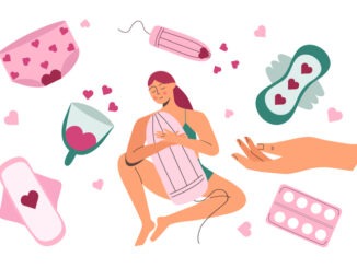 Menstrual cycle. PMS. The woman is holding a tampon. Various hygiene items