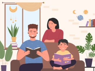 Happy family people reading books, sitting on sofa in cozy home living room