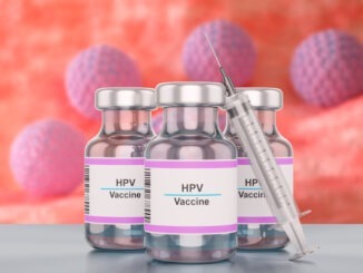Bottle of human papilloma virus HPV vaccine with syringe