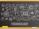 Drawing of tech items on a school blackboard - depicting technology in schools
