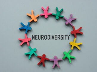 A Circle from colorful figures and sign neurodiversity.