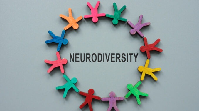 A Circle from colorful figures and sign neurodiversity.