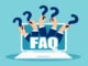 FAQ banner. Computer with hands holding question