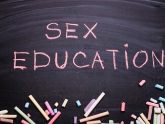 The word sex education written in chalk