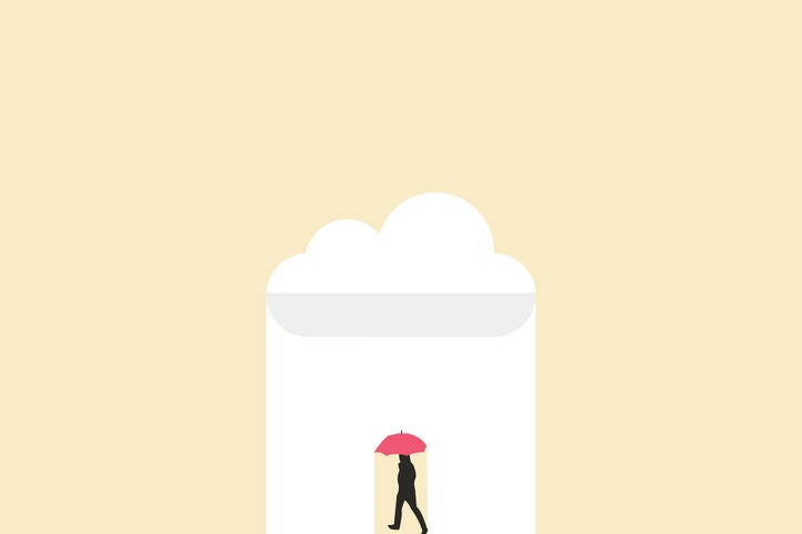 Businessman with red umbrella under rain. Symbol of protection, security Business and insurance