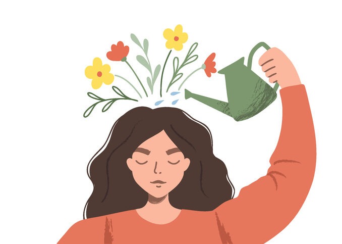 Thinking positive as a mindset. Woman watering plants that symbolize happy thoughts.