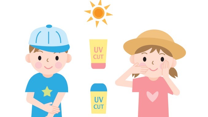 kids protect their skin from ultraviolet rays with sunscreen and hats.