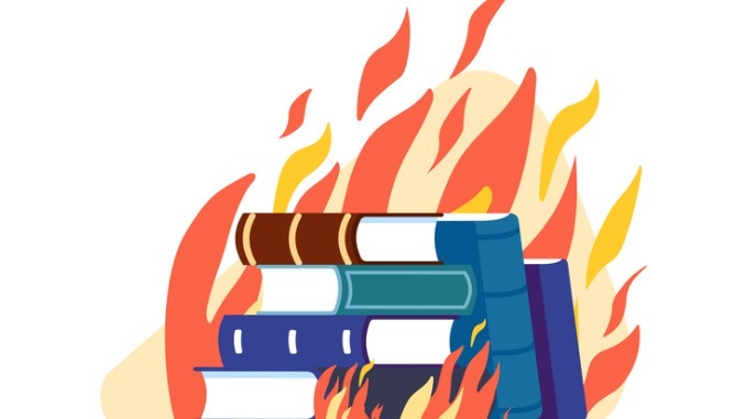 Textbooks burning in flame. Censored literature. Education destruction. Damaged knowledge