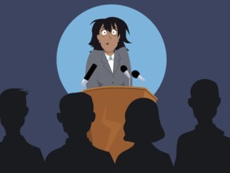 Terrified female speaker on a stage in front of the audience,