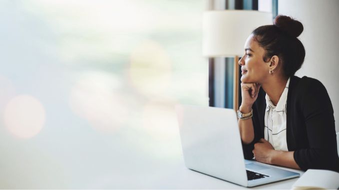 Banner, laptop and woman in office thinking with mockup, bokeh and ideas on business for trading.