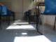 Low angled view of an empty classroom with sunlight