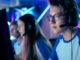 Team of Teenage Gamers Play in Multiplayer Video Game on a eSport Tournament.