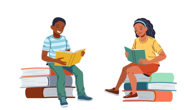 Girl and boy read sitting on stack of books