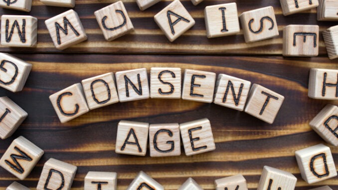 consent age wooden cubes with letters, sexual education 