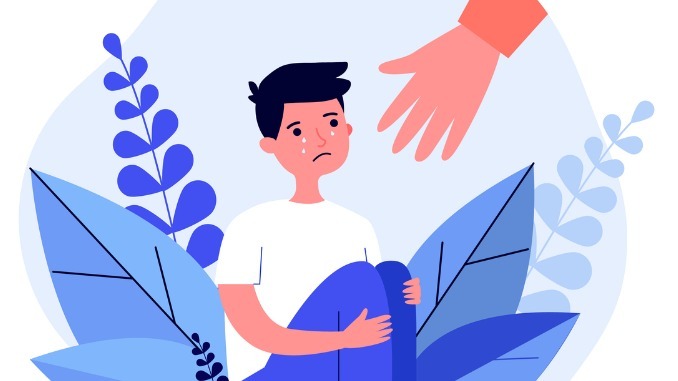 Helping hand for crying boy 