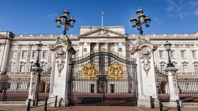 London, UK - 26th April 2018: The front of Buckingham Palace in the morning at sunrise with nobody around
