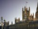 London's Houses of Parliament on a clear day at sunrise