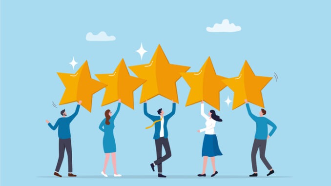 Employee survey, customer feedback rating or performance review, five stars service, best experience or feedback and engagement concept, business people employees holding 5 stars rating feedback.