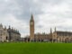 London, United Kingdom - April 19, 2025: A picture of Big Ben and the Palace of Westminster across the Parliament Square Garden, London.