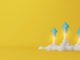 Three arrows soaring on yellow background. Business development to success and growing growth concept. 3d render illustration