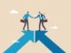 Cooperation partnership, work together for success, team collaboration, agreement or negotiation, collaborate concept, businessmen handshake on growth arrow joining connection agree to work together.