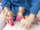 girl, child plays mother-daughters with miniature dolls, Examining the cognitive benefits of imaginative role-play, Childhood Imagination