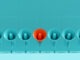 Important announcement, attention and different message concept. Blue megaphones in a row with one of them is in orange color on blue background. 3D render.