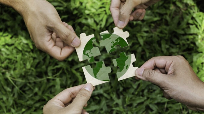 Group of volunteers help solve environmental problems. global teamwork and business. World environment day.