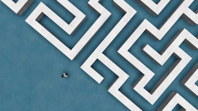 Top View of Man Entering Huge Concrete Maze - Symbol of Challenge, Confusion, and Life Journey 3D Render