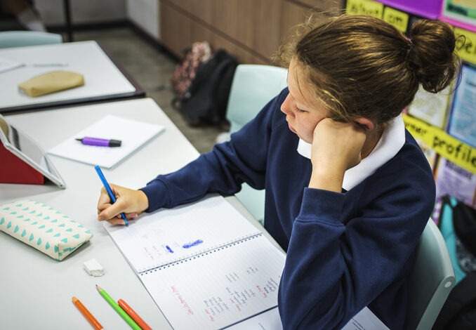 Student woman studying in the clsaarom
