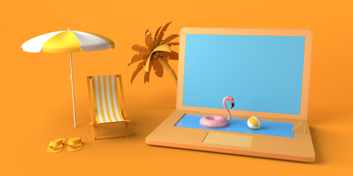 Laptop and beach accessories representing summer break
